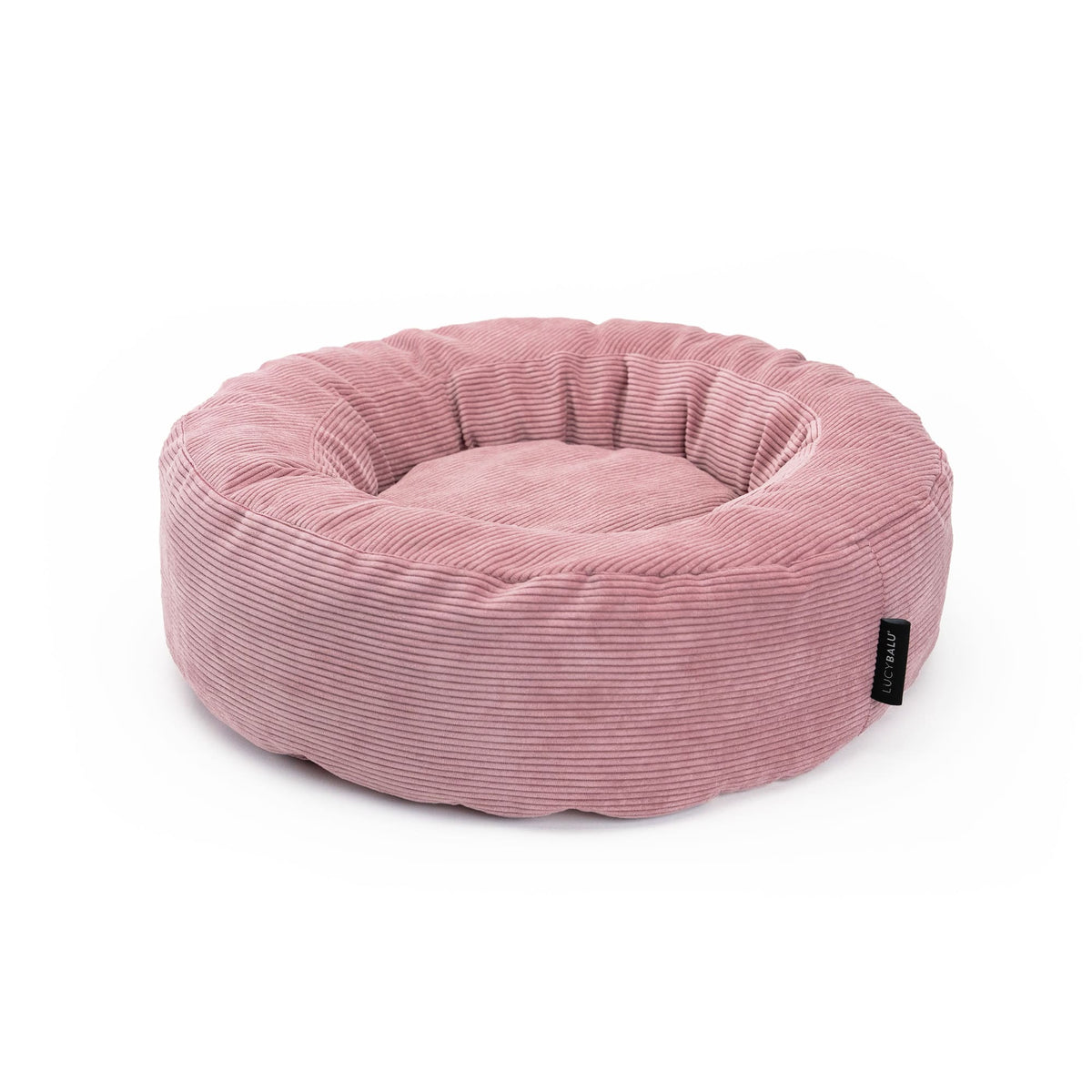Rundes Katzenbett aus weichem Cordstoff in Rosa, stilvoll und gemütlich